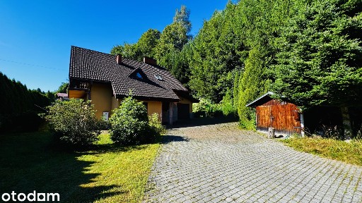 Dom z garażem i domkiem letniskowym, taras z jacuzzi BRENNA