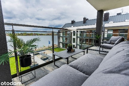 Apartament z panoramicznym tarasem na dachu i widokiem na jezioro
