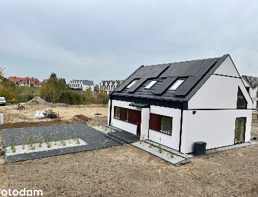 Dom Energooszczędny z Pompą Ciepła, Fotowoltaiką i Rekuperacją