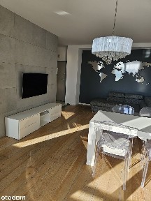 Przestronny apartament 60 m² z tarasem i miejscem garażowym