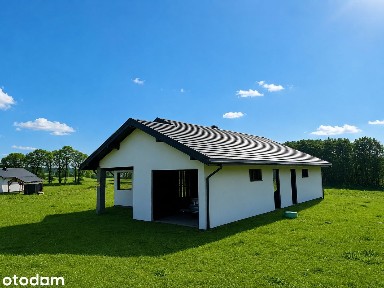 Wolnostojący dom na sprzedaż z garażem