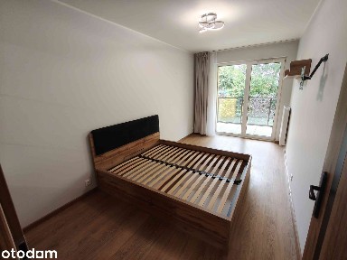 Przytulne 2-pokojowe mieszkanie z osobną kuchnią, balkonem i garażem