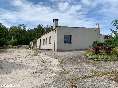 Działka o powierzchni gruntowej 6 323 m2 z 4 budyn