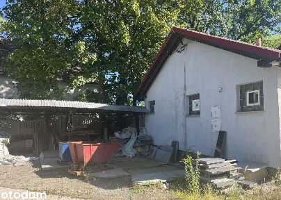 Nieruchomość z budynkiem 210 m² i działką 13 arów