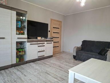 Słoneczne mieszkanie 54,2 m² z dużym balkonem, Parter, Uniejów - Osiedle 700-lecia