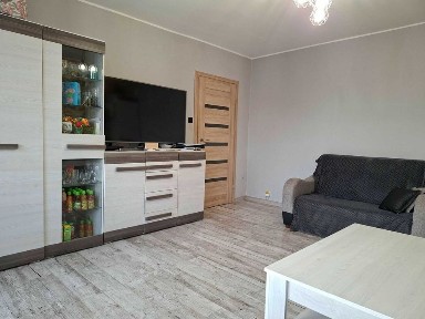 Słoneczne mieszkanie 54,2 m² z dużym balkonem, Parter, Uniejów - Osiedle 700-lecia