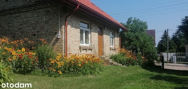Działka budowlana z domem i zabudowaniami gospodarczymi