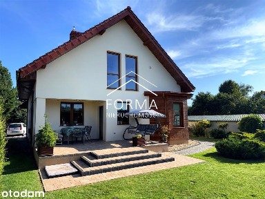Dom z piękną duża działką w spokojnej okolicy