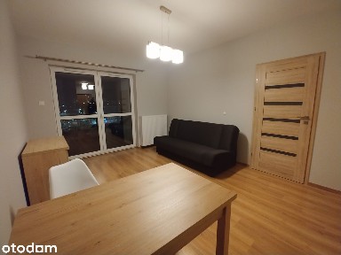 Kawalerka z oddzielną kuchnią, loggią i garażem