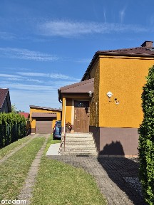 Dom w 100m2 z budynkiem gospodarczym, między lasami i jeziorami