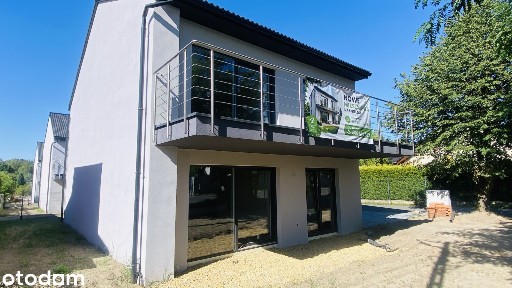 Nowoczesny apartament z ogródkiem w cichej i spokojnej okolicy.