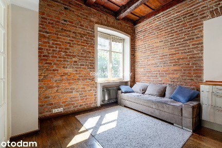 Dwupokojowy apartament z historycznym charakterem