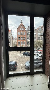Apartament z pięknym widokiem na stare miasto i dużą loggią.