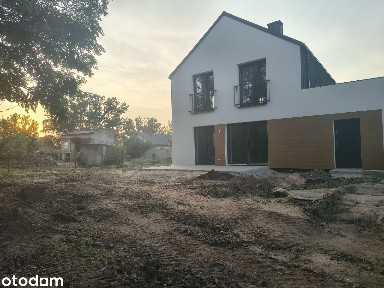 Dom z garażem i dużą działką