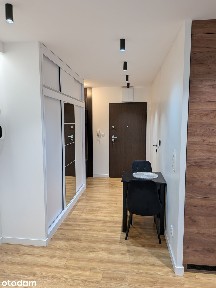 Mieszkanie z tarasem, garażem i komórką lokatorską na sprzedaż