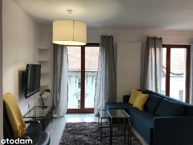 Przytulna kawalerka z balkonem w apartamentowcu na Starym Mieście