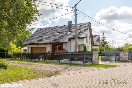 Schludny dom z ogrodem i garażem, poza miastem
