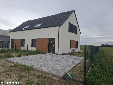 Dom w zabudowie dwulokalowej 112,0m, 2 km Kórnik, przy drodze gminnej.