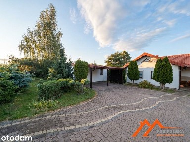 Dom 98 m² z budynkiem gospodarczym i dwoma garażami - działka 1017 m²
