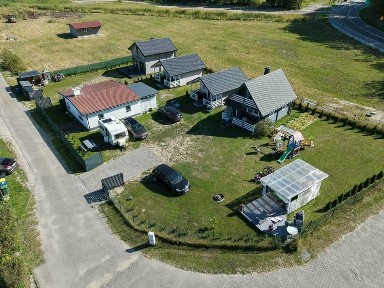 Dochodowa posiadłość z 4 domkami całorocznymi i kawalerką - gotowy biznes lub oaza spokoju!