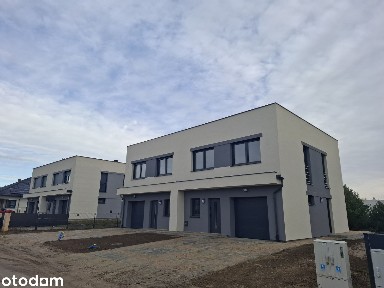 Wygodny dom - bliźniak 4‑pokojowy z garażem i ogrodem