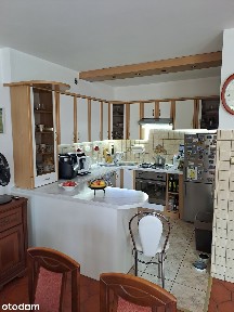 Komfortowy szeregowiec 99,5 m2 w Luboniu - fotowoltaika, garaż.