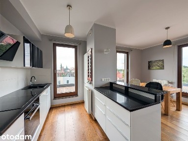 Apartament na ost. piętrze z tarasem i widokiem na Wawel | Osiedle Fi