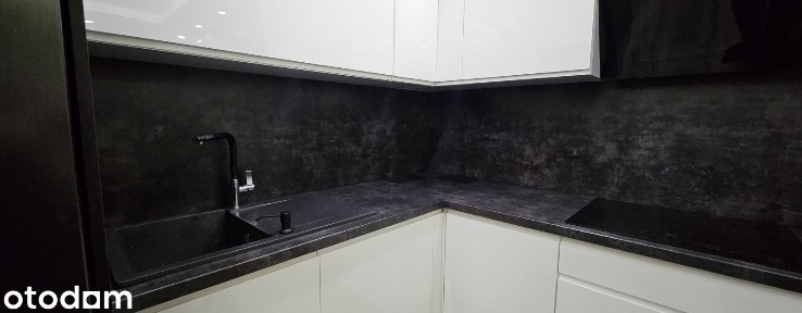 Sprzedam 2 pokoje 41m2 - pełne wyposażenie, garaż i komórka w cenie!