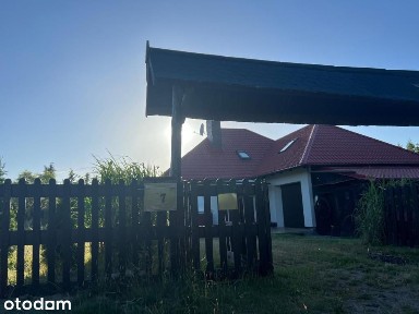 Wyjątkowy dom 144 m² z garażem przy jeziorze Szteklin, działka 1200 m²