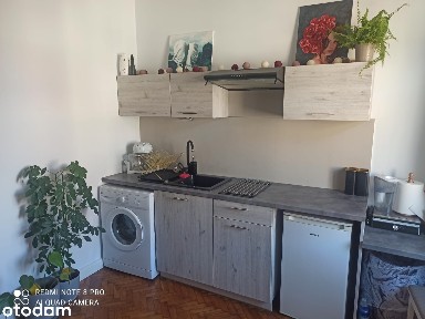Piękna kawalerka w kamienicy z balkonem obok parku Wilsona