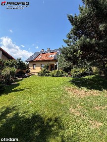 Przytulny dom z pięknym ogrodem i garaż na 2 auta