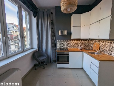 Przestronne i wysokie mieszkanie w kamienicy z balkonem