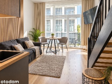 Klimatyczny loft z antresolą i balkonem