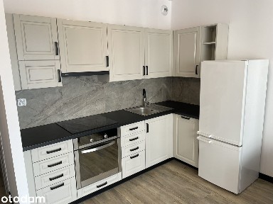 Nowy apartament 50,55 m² z garderobą i parkingiem - Pierwszy najemca!