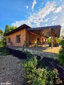 Dom Parterowy wkomponowany w naturalną przestrzeń