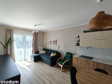 Nowy apartament z ogródkiem i garażem - Pierwszy najem! (Podolany)