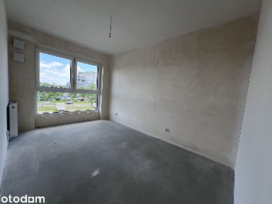 Nowe gotowe, przy samej Magnolii, duże okna od zachodu
