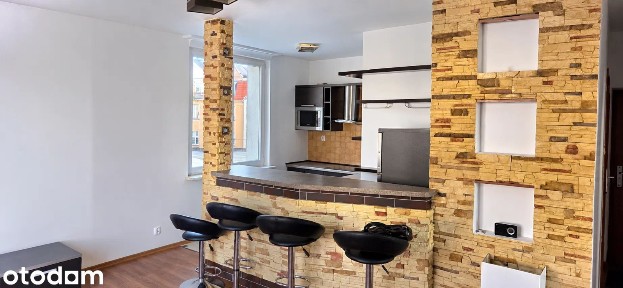 Jasne i funkcjonalne mieszkanie 2-pokojowe o pow. 54,83 m² w centrum.