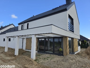 Luksusowy dom nad morzem | Salon 55 m² | Nowoczesna bryła