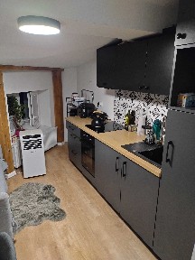Pokój premium z własną łazienką i aneksem kuchennym (mikrokawalerka)