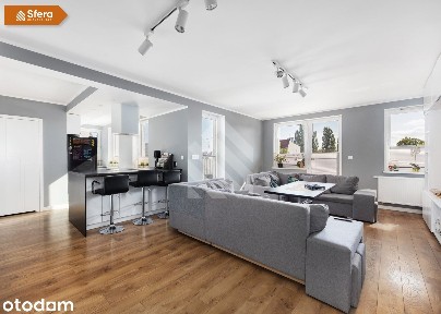 Przestronny apartament z tarasem i balkonem.