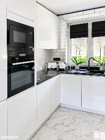 Dom w zabudowie szeregowej z ogrodem | 91,25 m² |