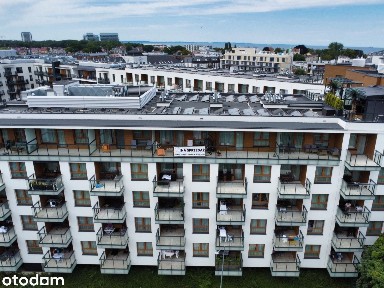 Atrakcyjne mieszkanie z tarasem w apartamentowcu