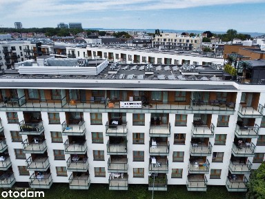 Atrakcyjne mieszkanie z tarasem w apartamentowcu