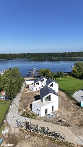 Dom - apartament wypoczynkowy nad brzegiem Jezioraka z plażą i mariną