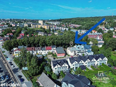 Dom mieszkalny z parterem handlowo-usługową. Garaż, początek Rokosowa.