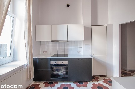 Przestronne studio w kamienicy w ścisłym centrum