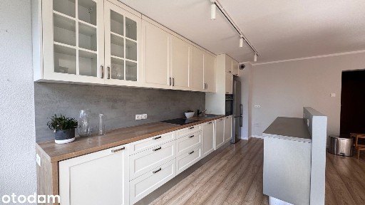 Apartament dwupoziomowy z tarasem, sauną i garażem blisko parku