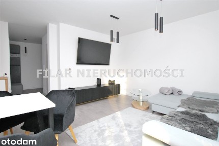 apartament z ogrodem i garażem