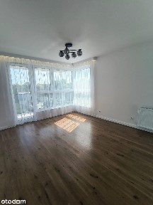 Apartament z 2 miejscami postojowymi i prywatną ładowarką do samochodu
